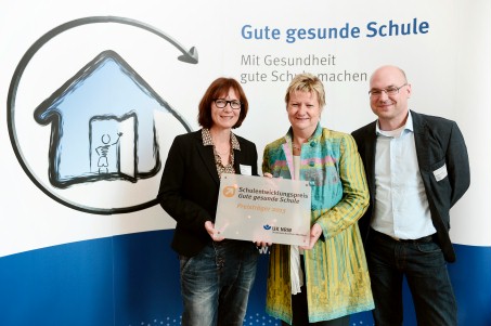 Foto der Schulleitung mit Ministerin Löhrmann