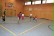 Das Foto zeigt fußballspielende Schüler in unserer großen Turnhalle.